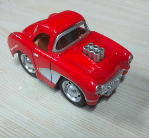 Red master—pull-back door with movable nose—car toy